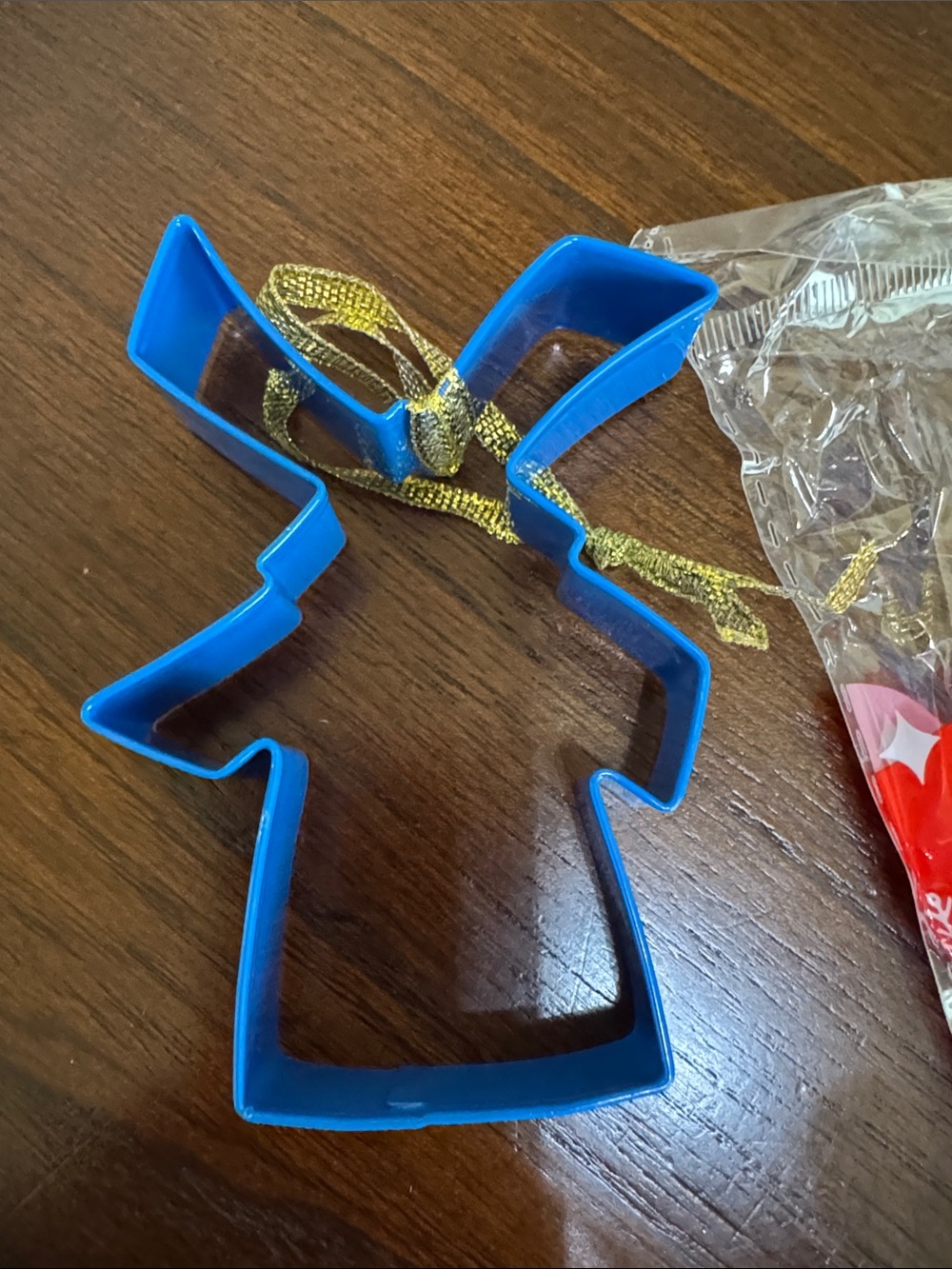 Dutch Bros Blue Angel Cookie Cutter with Gold Ribbon
